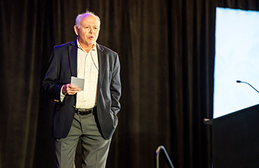 photo of presenter in education session